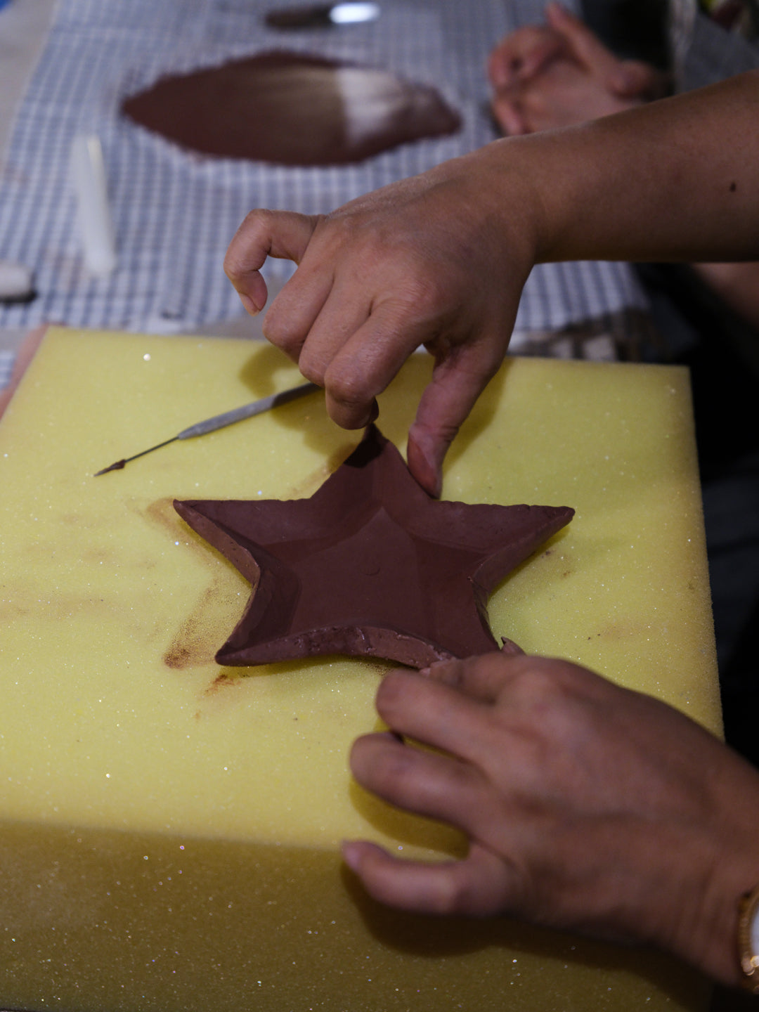 Kids making pottery at Ceramic Cube summer camp